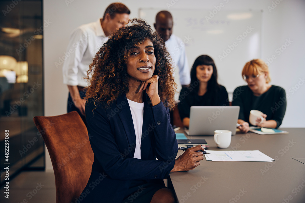 Businesswoman smiling during a meeting
