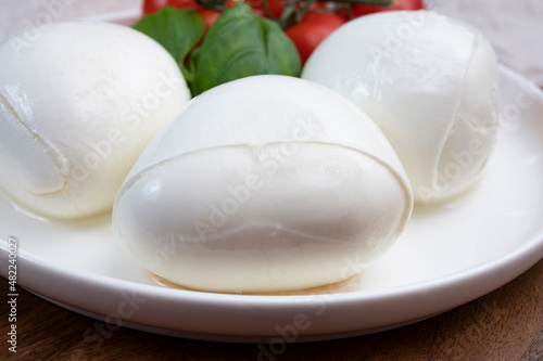 Tasing of fresh italian cheese mozzarella di buffalo