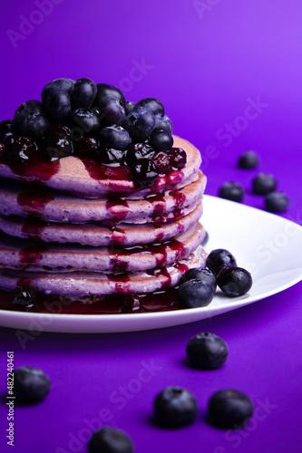 Stacked Purple Pancakes with Blueberry Syrup