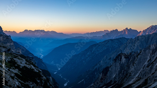 Sunrise over a mountain valley in the Dolomites, Italy