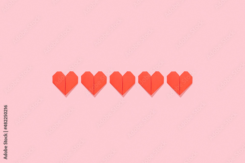Loading from red paper hearts. Valentine's day concept.