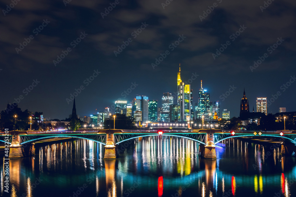 Night cityscape of the illuminated skyscrapers of Bankenviertel in Frankfurt am Main, city in Germany
