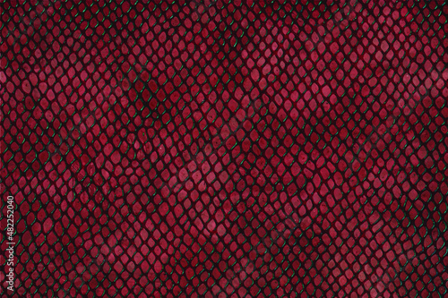 Black and red leather snakeskin cement wall