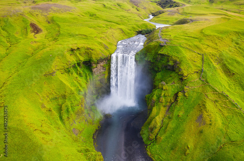 Iceland. Aerial view on the Skogafoss waterfall. Landscape in the Iceland from air. Famous place in Iceland. Landscape from drone.