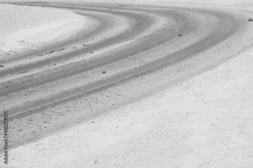 Slippery roadway curved after a snow storm