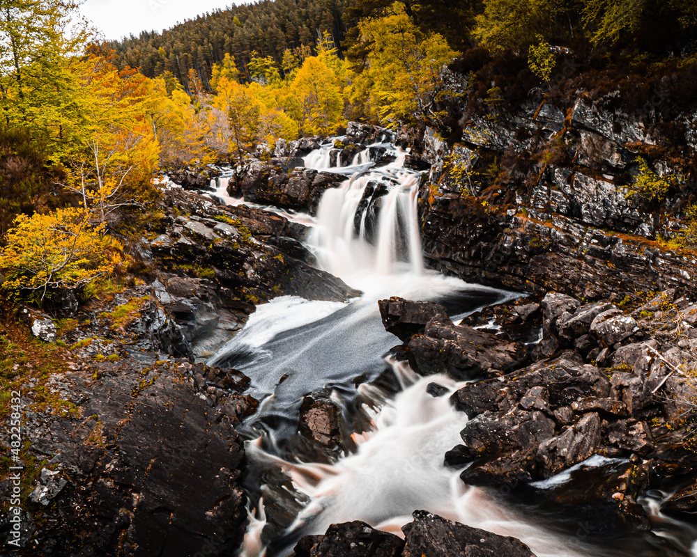 Scenic Waterfall in an Scotland Autumn Forest Scenic Waterfall in an Scotland Autumn Forest
