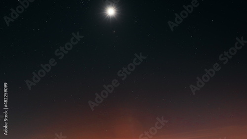 4K Night Starry Sky With Glowing Stars And Mon In Rotation. Nature Natural Night Starry Sky Background.