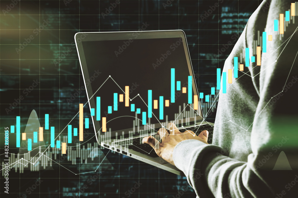 Hacker hand using laptop with dark candlestick forex chart on blurry grid background. Trade, hacking, data, finance and invest concept. Double exposure. Hacker hand using laptop with dark candlestick forex chart on blurry grid background. Trade, hacking, data, finance and invest concept. Double exposure.