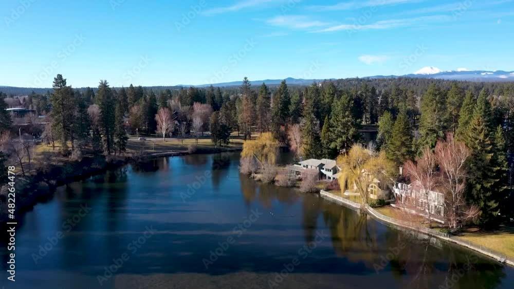 Aerial flyover of Mirror Pond on the Deschutes River in downtown Bend, Oregon. Aerial flyover of Mirror Pond on the Deschutes River in downtown Bend, Oregon.