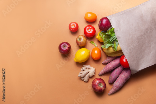 Fruits and vegetables on the table in a bag grocery shopping food deliver sustainaility concept