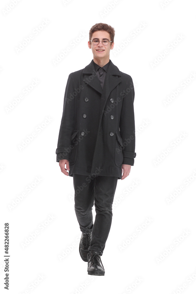 Fashion shot of a young man in black coat on white background Fashion shot of a young man in black coat on white background