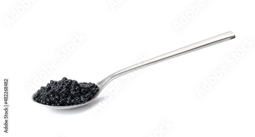 black paddlefish caviar in a metal spoon on a white isolated background