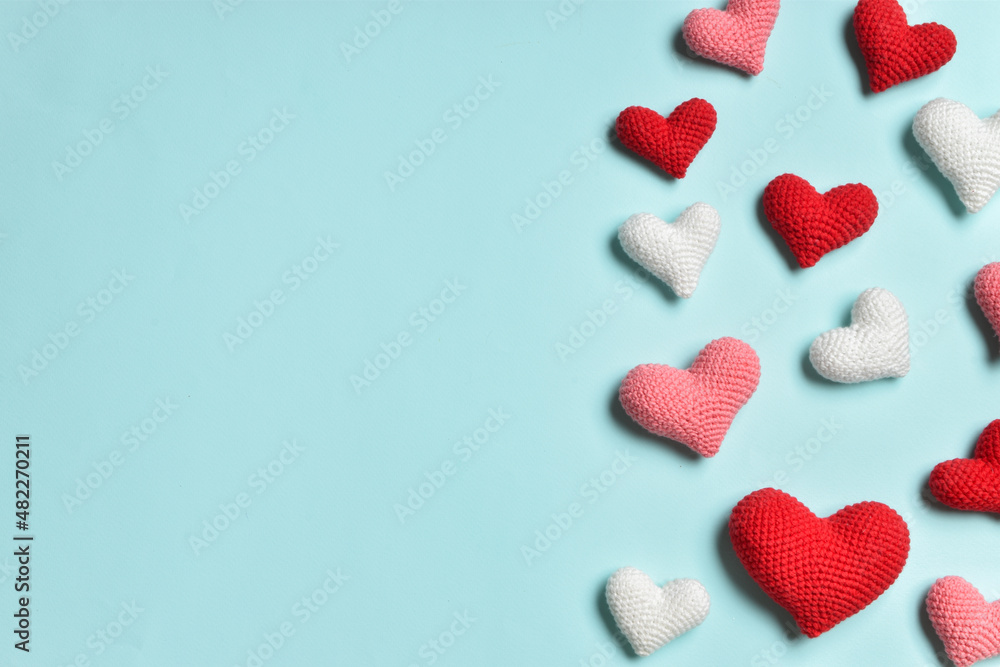 Fototapeta premium A holiday card with red hearts. Banners for Valentine's Day. Background on February 14. Space for copying. Flat position, top view