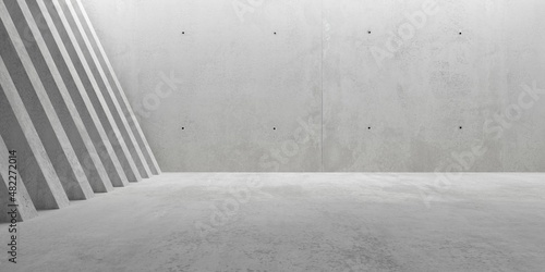 Fototapeta Naklejka Na Ścianę i Meble -  Abstract empty, modern concrete walls room with indirect ceiling light opening in the back and sliced sloped wall on the left - industrial interior background template