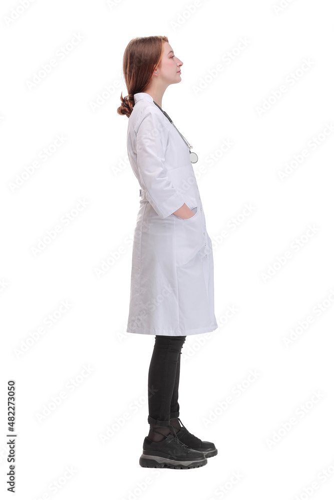 Beautiful young doctor woman wearing white coat over isolated background looking to camera Beautiful young doctor woman wearing white coat over isolated background looking to camera