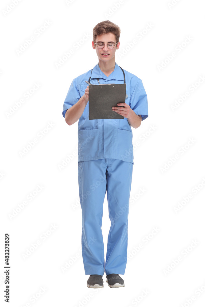 Front view of happy smiling doctor writing on clipboard Front view of happy smiling doctor writing on clipboard