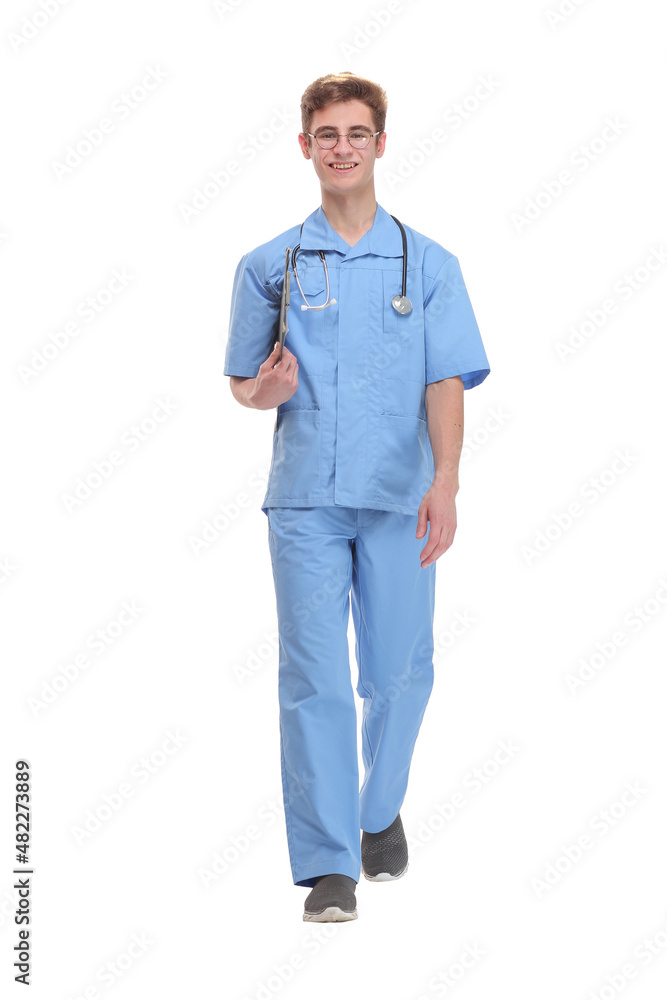 Full length front view shot of a doctor with a clipboard walking Full length front view shot of a doctor with a clipboard walking