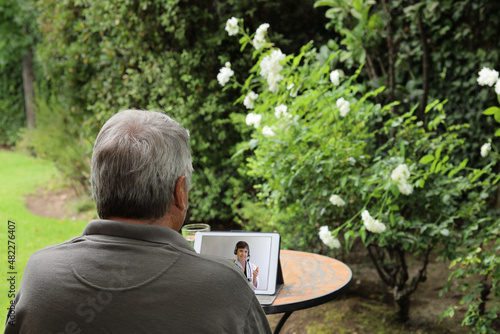 A senior man in a telemedicine session