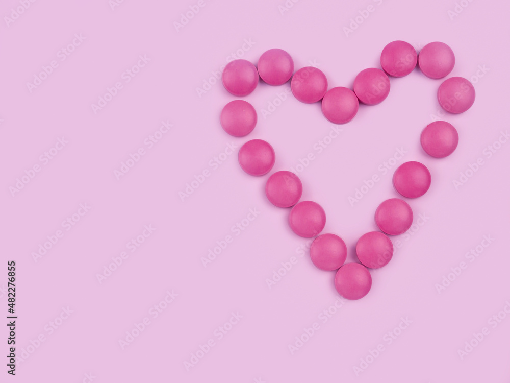 Heart shaped pills. Health treatment healthy lifestyle choices concept. Pharmaceuticals. A place to copy. Valentine's Day