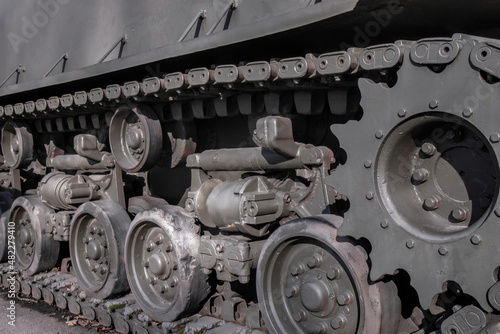 Side view of tracks on  WWII M4A2E8 Sherman tank, outdoors, daytime, nobody photo