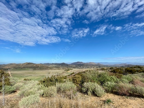 Fotografija Wide view across scrubland towards mountains in Thousand Oaks area,  CA, seen from Point Mugu State Park