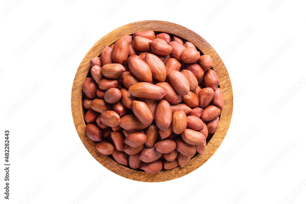 peanut indian peeled in wooden bowl isolated on white background. Vegan food, top view. peanut indian peeled in wooden bowl isolated on white background. Vegan food, top view.