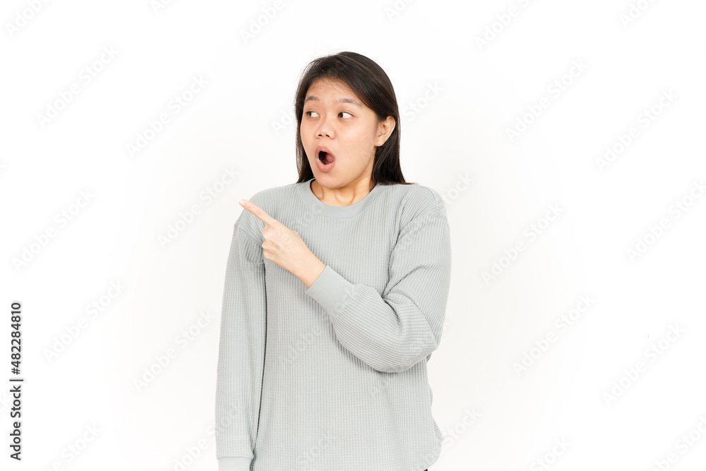 Pointing Product on the Side Of Beautiful Asian Woman Isolated On White Background Pointing Product on the Side Of Beautiful Asian Woman Isolated On White Background