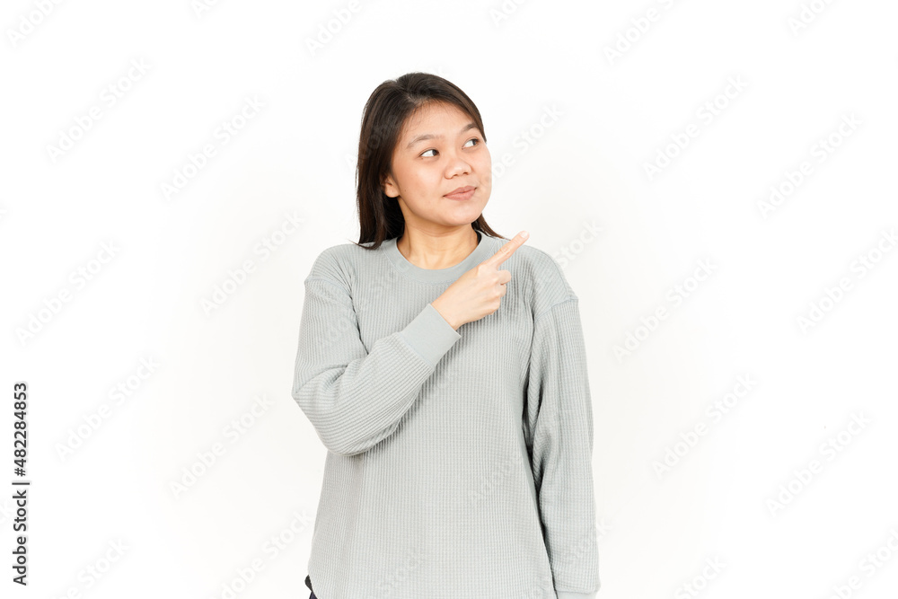 Pointing Product on the Side Of Beautiful Asian Woman Isolated On White Background Pointing Product on the Side Of Beautiful Asian Woman Isolated On White Background