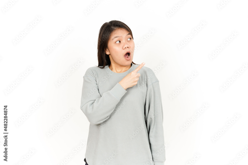 Pointing Product on the Side Of Beautiful Asian Woman Isolated On White Background Pointing Product on the Side Of Beautiful Asian Woman Isolated On White Background