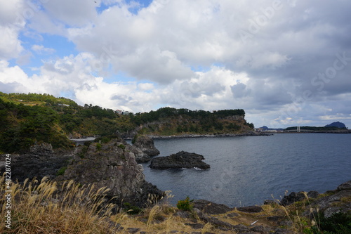 rock coast and charming clouds