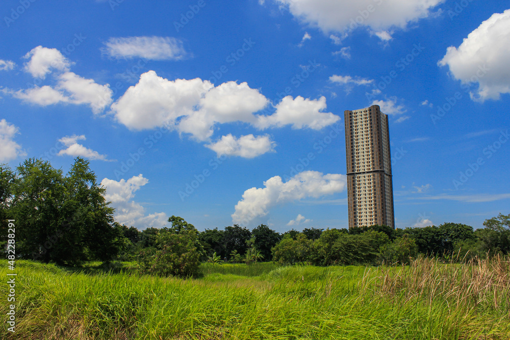 Apartment buildings in the middle of a meadow on the outskirts of Surabaya
