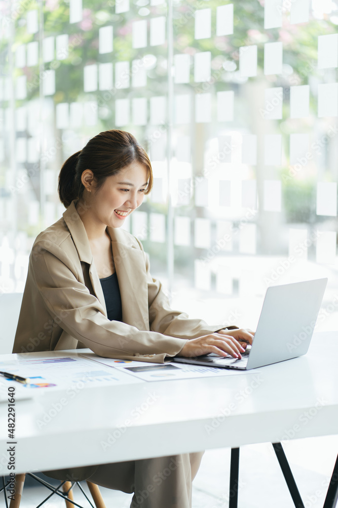 Portrait of smiling beautiful business asian woman working in office use computer with copy space. Business owner people sme freelance online marketing e-commerce telemarketing, work from home concept Portrait of smiling beautiful business asian woman working in office use computer with copy space. Business owner people sme freelance online marketing e-commerce telemarketing, work from home concept
