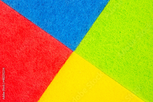 colored samples of felt material. industrial textile industry. background texture © photosaint