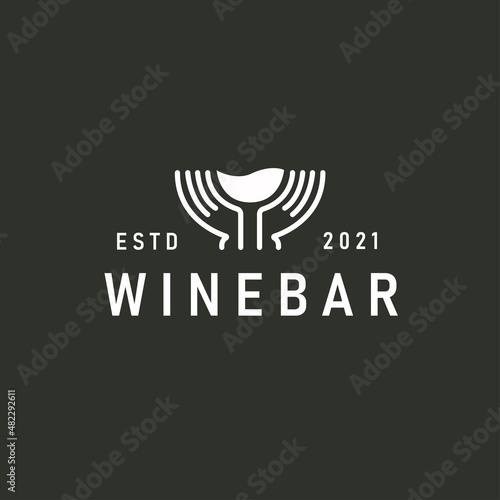 Wine bar Logo with hand holding glass of wine vector illustration logo template for wine bar or sommelier courses.