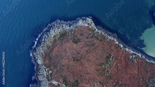 AERIAL - Map view over the Isle of Gigha, Kintyre, Scotland, top down circle pan photo