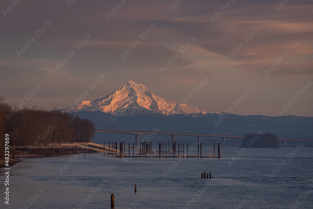 Fototapeta premium Mt Hood, Oregon, glowing at sunset over the Columbia River from Vancouver Washington