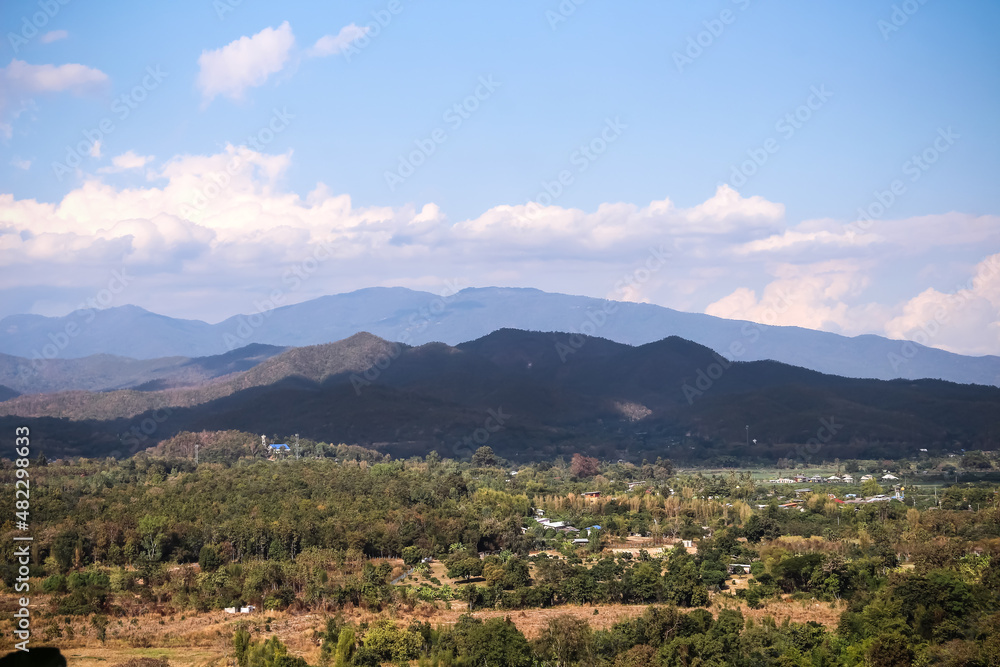 Mountain view lanscape on vast blue sky clouds,background in Mae Wang District in Chiang Mai of Thailand