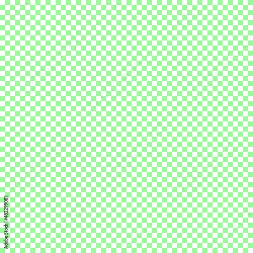 Checkerboard with very small squares. Pale Green and White colors of checkerboard. Chessboard, checkerboard texture. Squares pattern. Background.