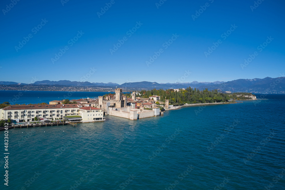 Sirmione aerial view. Top view of the historic center of the Sirmione peninsula, lake garda. Lake Garda, Sirmione, Italy. Italian castle on Lake Garda. Aerial panorama of Sirmione.