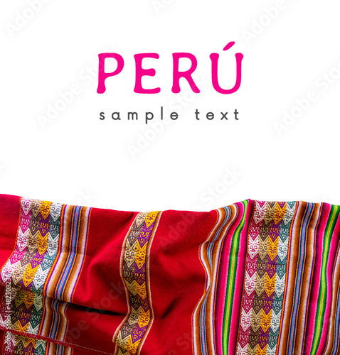 Peru. Colorful traditional Inca Lliclla blanket on a white background