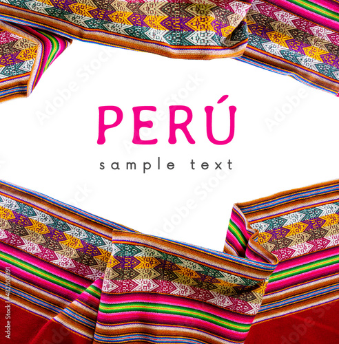 Peru. Colorful traditional Inca Lliclla blanket on a white background