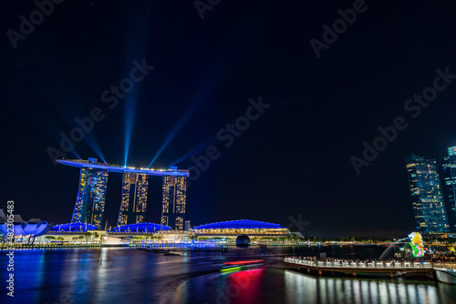 City view at Singapore central area at night with light trails.