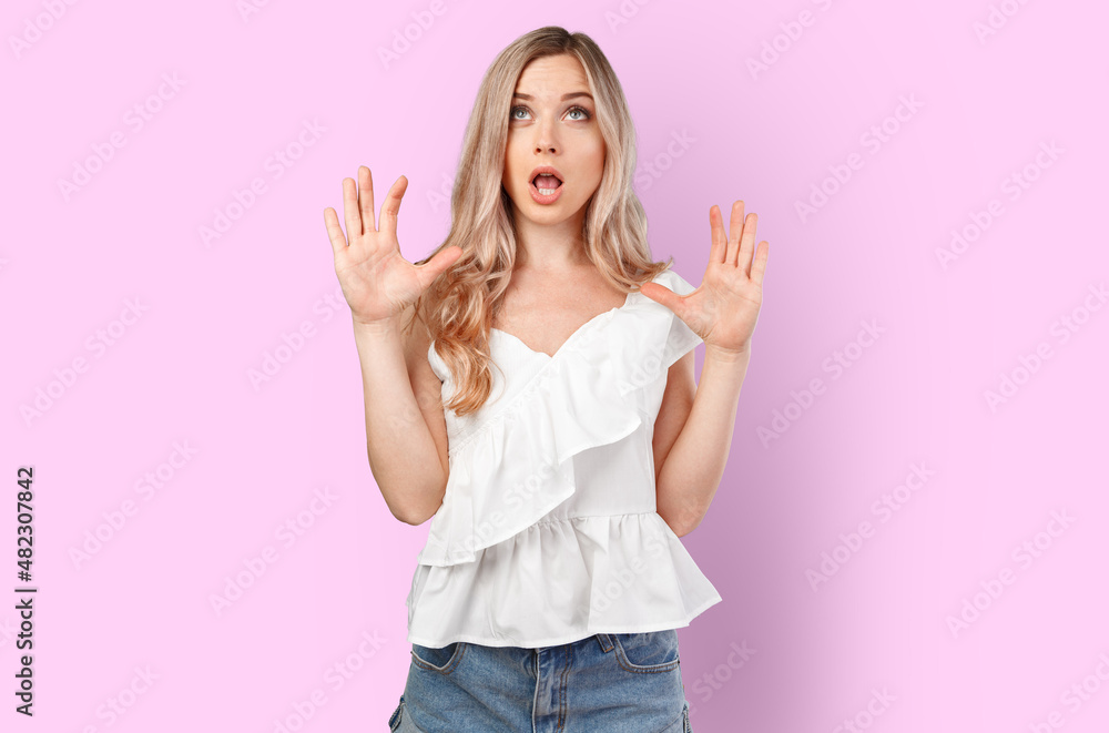 Emotional angry woman screaming on color isolated studio background. Emotional angry woman screaming on color isolated studio background.