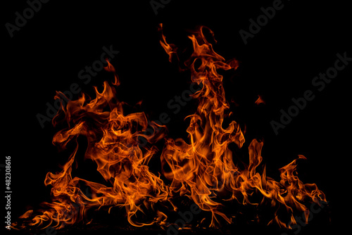 Fire flames on black background. Fire burn flame isolated, abstract texture. Flaming effect with burning fire.