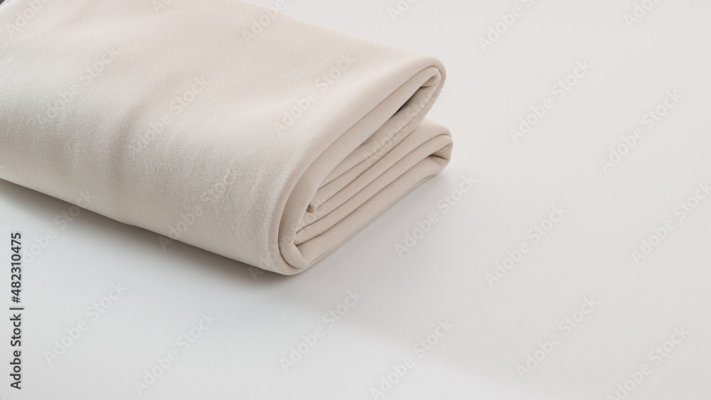 Rolls of bright colored fabric on a white background. Rolls of bright colored fabric on a white background.