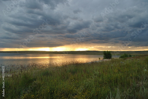 Beautiful sunset. Sunset on the sea  lake. Evening landscape.