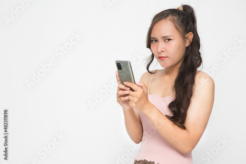 Cute Asian woman is angry and chatting about something for social media concept
