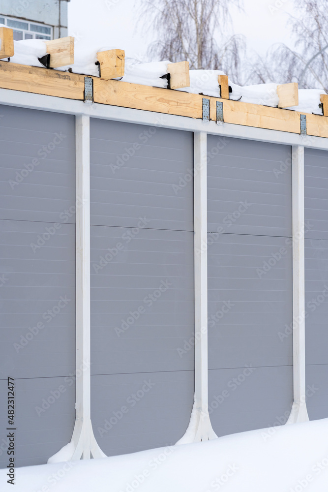 A building made of insulated sandwich panels in winter A building made of insulated sandwich panels in winter