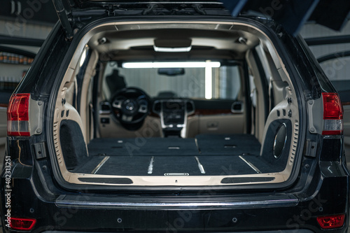 Clean open empty car trunk in the car detailing service © fotofabrika