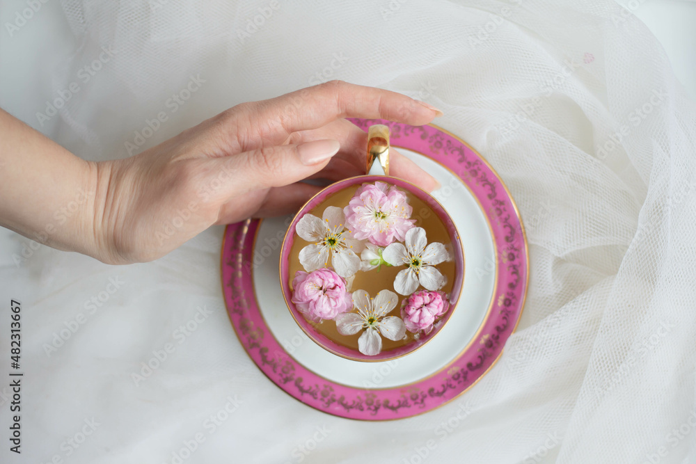 tea with fresh flowers in cup tea with fresh flowers in cup